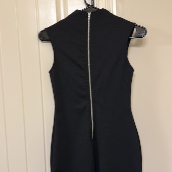 Black elegant tight fitting dress shows off your lovely curves must I say more!l - Picture 3 of 7